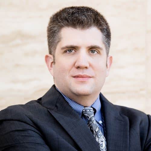Professional portrait of a male attorney in a suit, representing the Law Office of Bryan Fagan, emphasizing personal injury legal services in Texas.